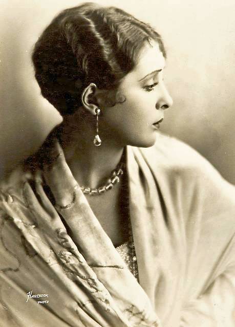 studio-portrait-movie-star-billie-dove-profile-in-silky-robe-and-heavy-jewels-hair-french-short