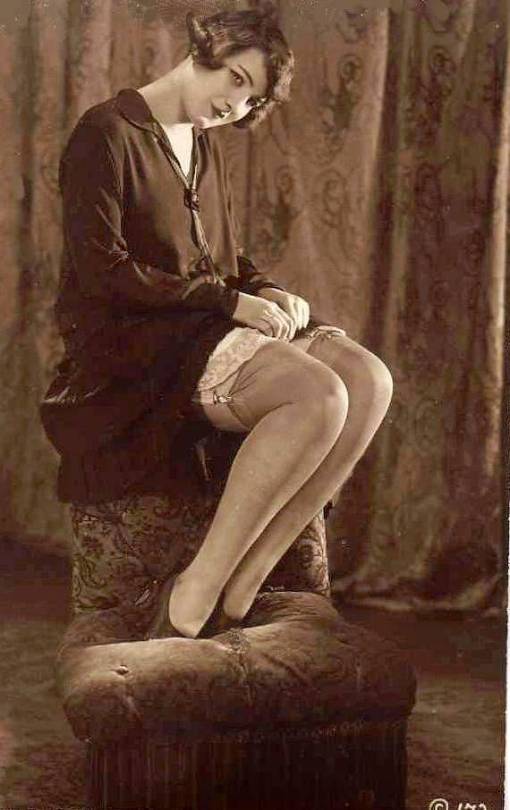 photo-likely-for-arcade-card-pin-up-woman-sitting-in-flapper-dress-showing-her-silk-stockings1