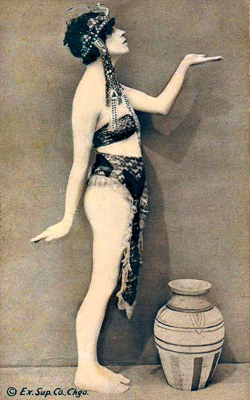 a-arcade-card-exhibit-supply-company-pin-up-woman-standing-profile-in-egyptian-like-pose-and-head-dress-1920s1